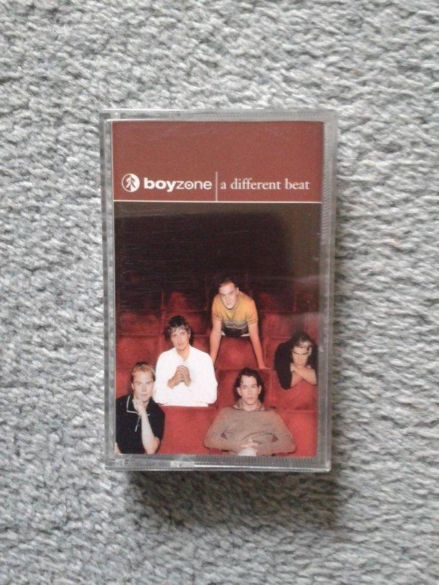 Preview of the first image of Boyzone - A Different Beat (Cassette, 1996).
