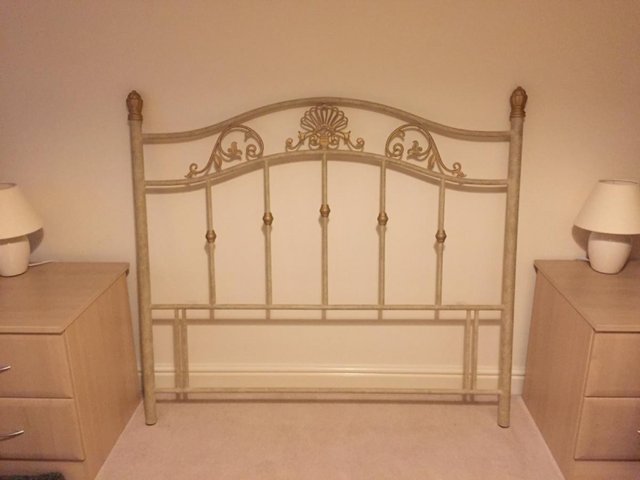 Preview of the first image of Gold Effect Metal Headboard (4ft 6in).