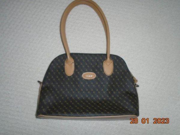 Image 1 of Envy dark brown zipped handbag with tan handles and trim