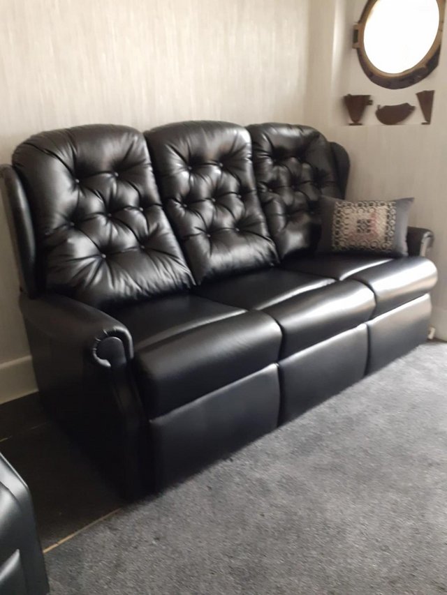 Preview of the first image of 3 Seater Woburn fixed Black Leather Sofa.