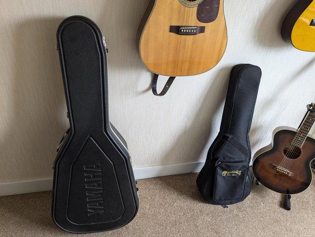 Preview of the first image of Yamaha lined guitar case.