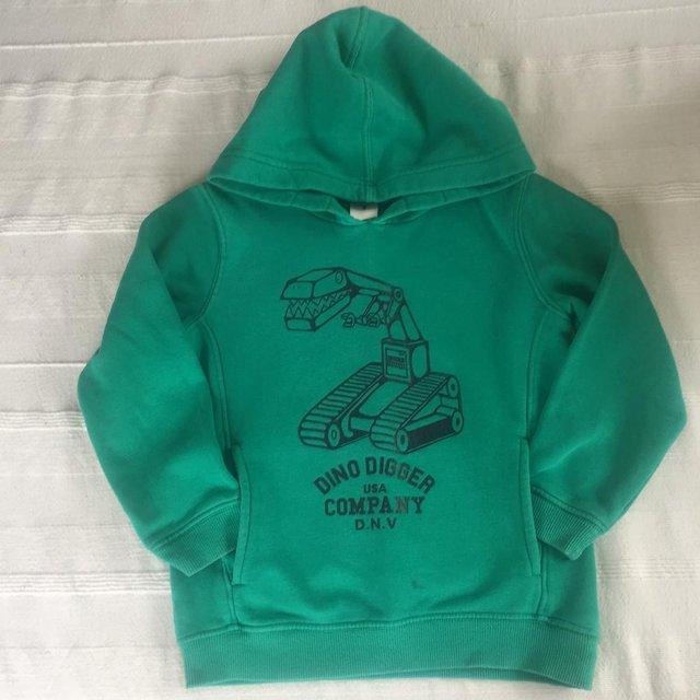 Preview of the first image of Green hoodie. Age 6. 'Dino Digger'.