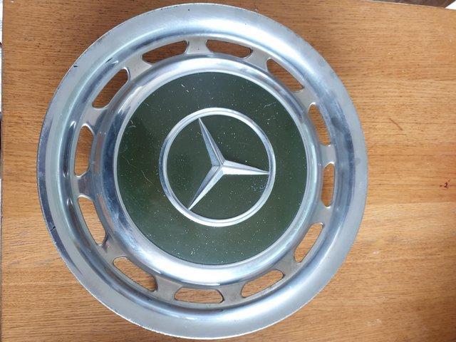 Preview of the first image of Mercedes w123 metal wheel covers.