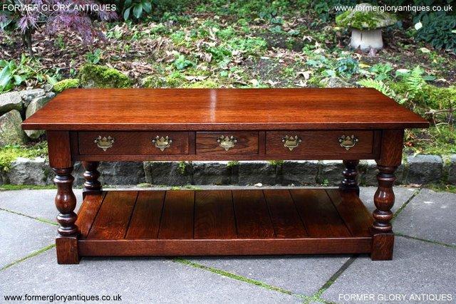 Image 23 of TAYLOR & Co STRESSED OAK THREE DRAWER POTBOARD COFFEE TABLE