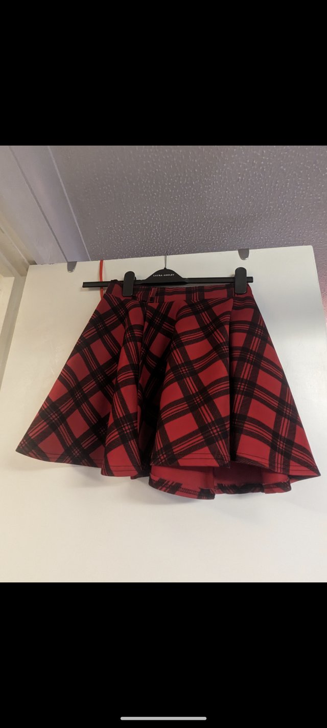 Preview of the first image of Women's skirts available unworn size M/12.
