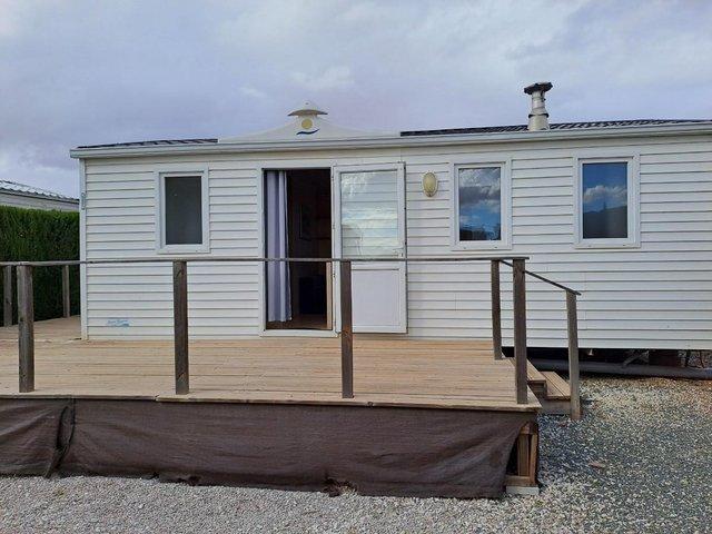 Preview of the first image of REDUCED RS 1739 Trigano mobile home with decking.