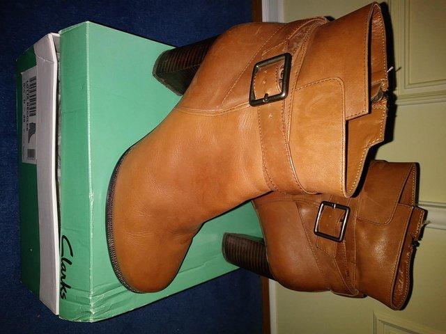 Preview of the first image of LADIES DARK TAN LEATHER BOOTS..
