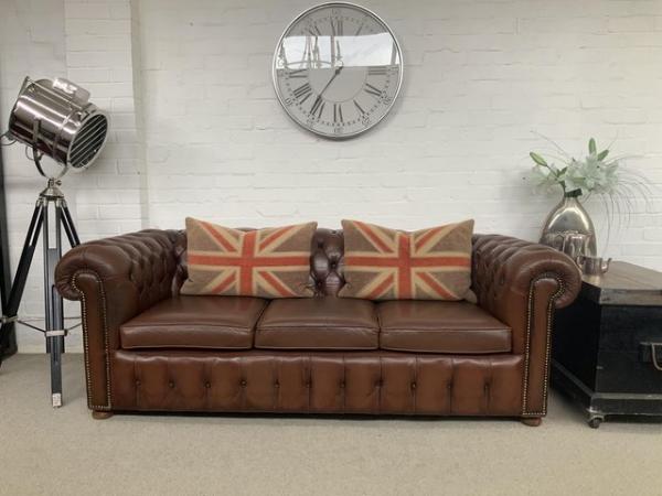 Image 1 of Saddle brown 3 seater Chesterfield sofa. Can deliver.