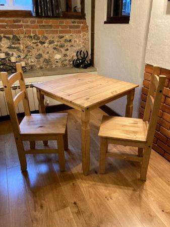Image 1 of Small Wooden table with 2 chairs