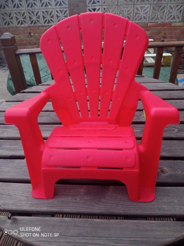 Preview of the first image of Childs Red fan Chair, used, in good condition.