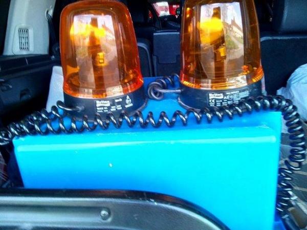 Image 2 of 2 used 12 volt britex  orange revolveig lights no dameage