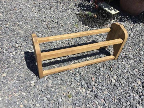 Image 1 of Solid oak shoe rack I. A gothic type style