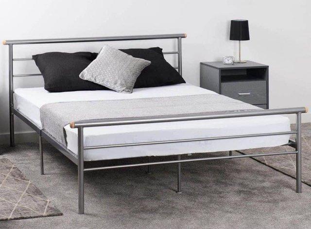 Preview of the first image of 4 foot Orion silver metal bed frame.