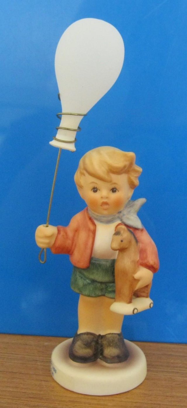 Preview of the first image of M J Hummel Figure - Carnival Fun. 13cm tall inc. balloon.