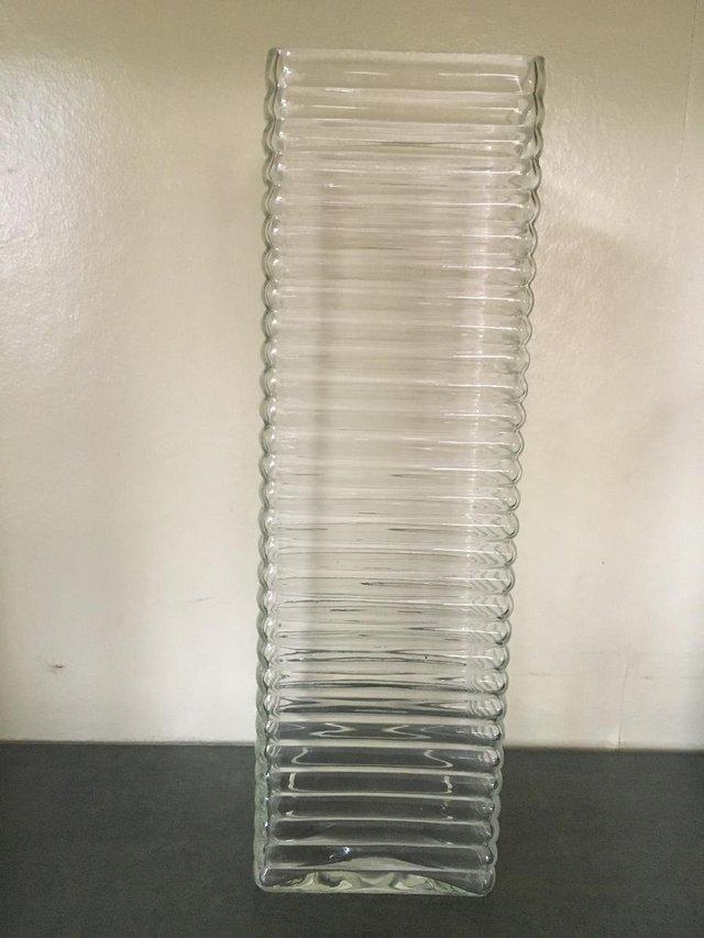 Preview of the first image of Impressive, tall, ribbed, square clear glass vase..