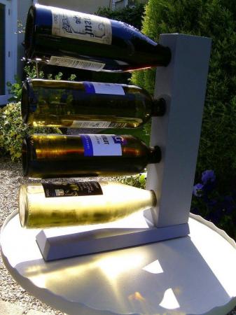 Image 3 of Wooden wine rack that hold s4 bottles