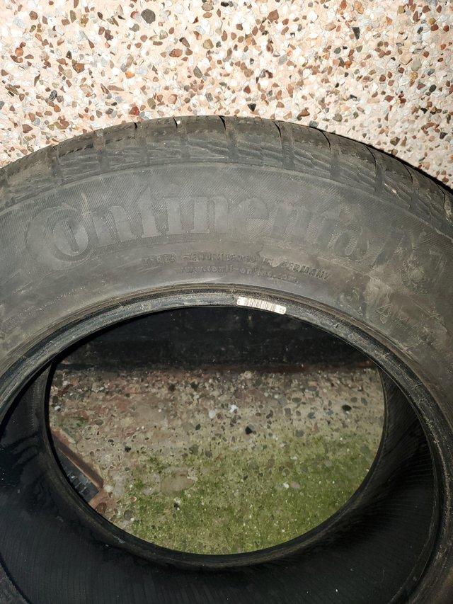 Preview of the first image of CONTINENTAL TYRE 235X65X17PART WORN.