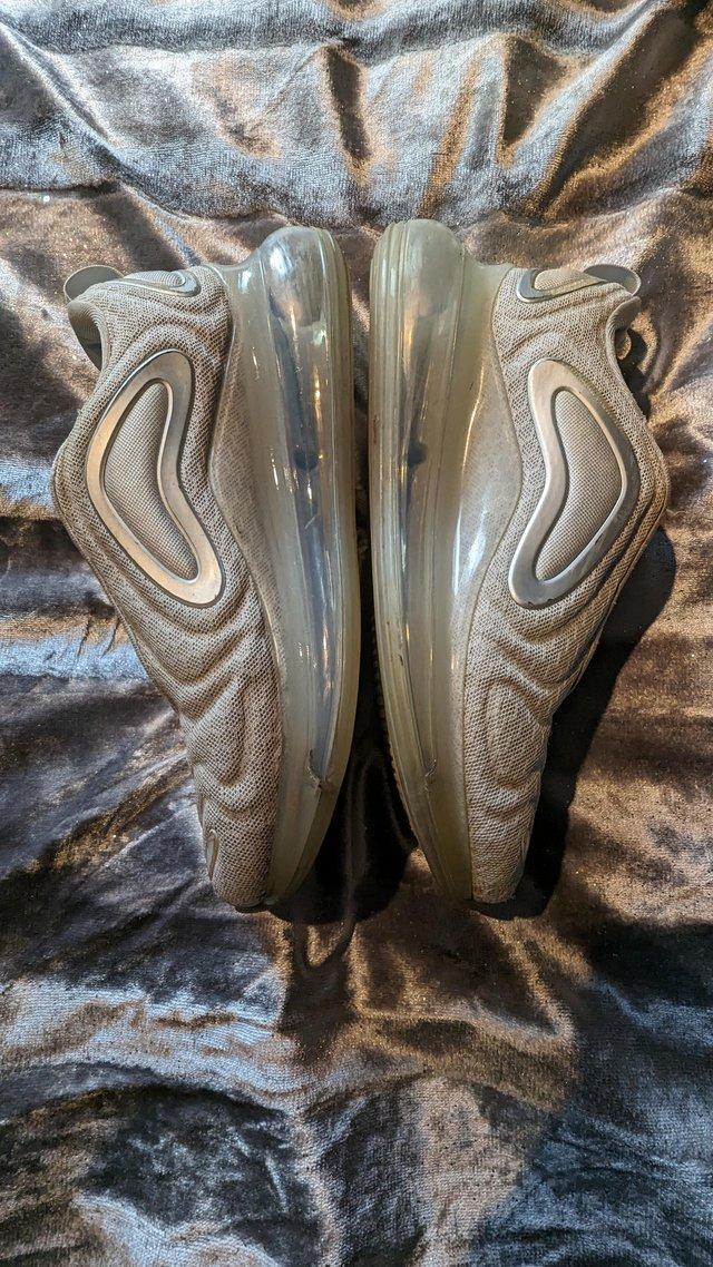 Preview of the first image of Nike Air max 720,, size 6, cream in colour with pink tics.