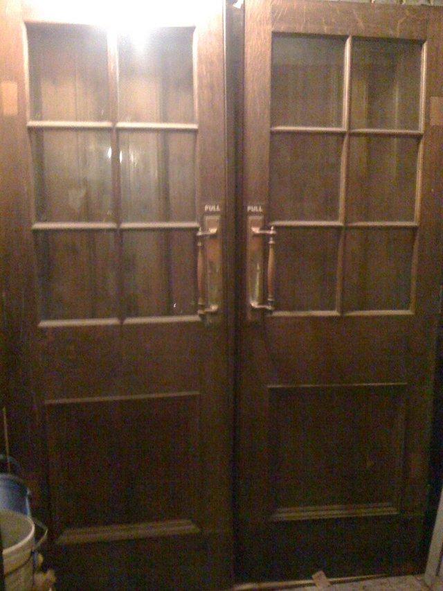 Preview of the first image of A pair of Reclaimed Victorian Oak library doors.