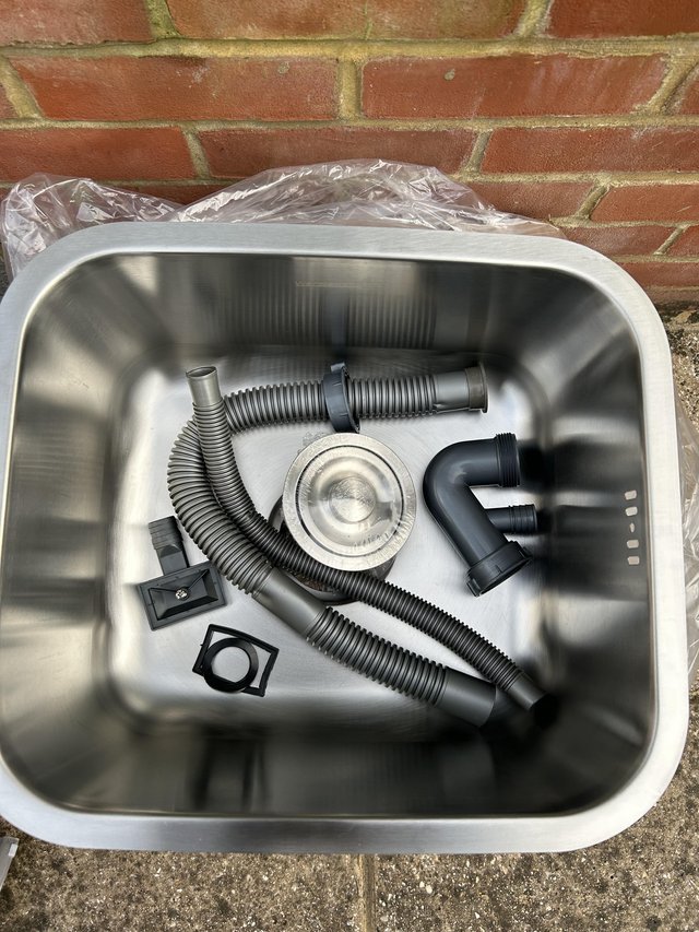 Preview of the first image of not used stainless steel kitchen sink with waste pipe kit.