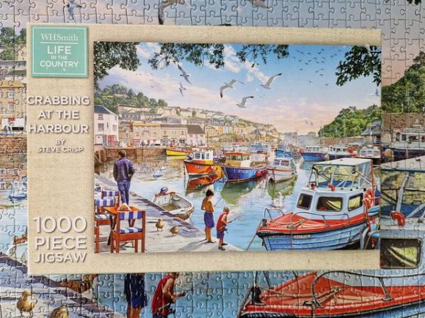 Image 1 of 1000 piece jigsaw called CRABBING AT THE HARBOUR by W.H.SMIT