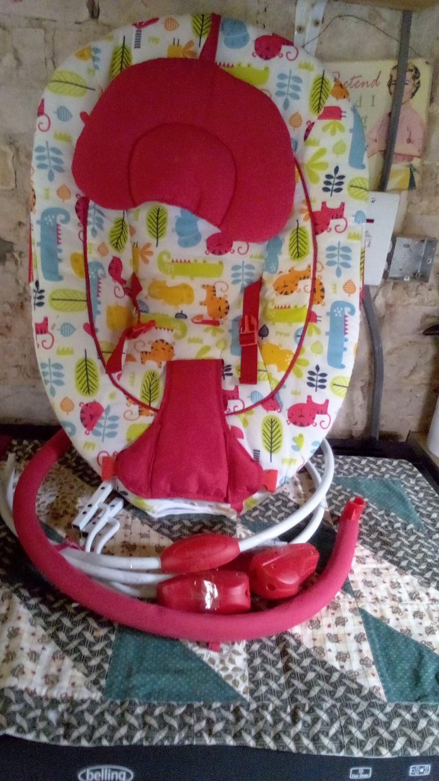 Preview of the first image of Padded baby bouncychair.