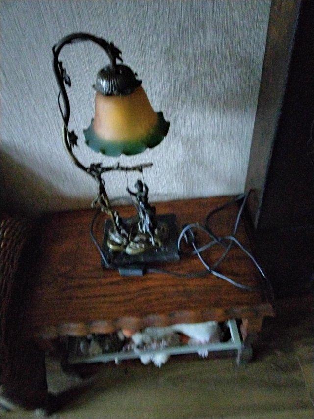 Preview of the first image of Swing girl marble base lamp 20 inch high green and Amber sha.