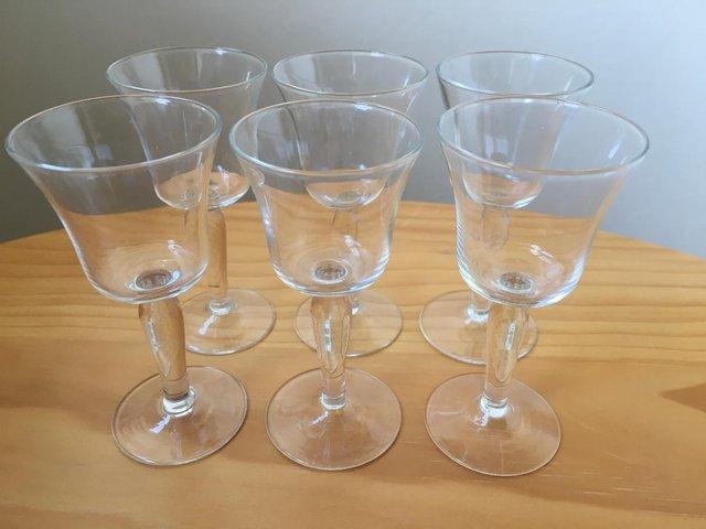 Preview of the first image of 6 vintage matching small stemmmed clear glasses..