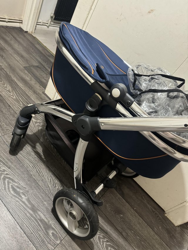 Preview of the first image of Navy Egg pram and carrycot.