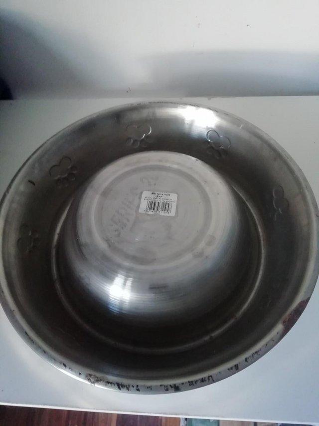 Preview of the first image of 3 LARGE stainless steel dog food / water bowls.