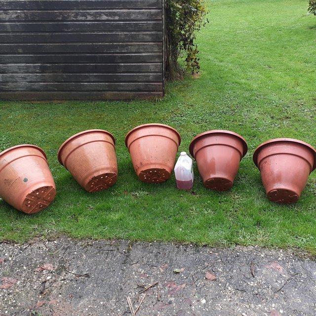 Preview of the first image of 5 large plastic planters..