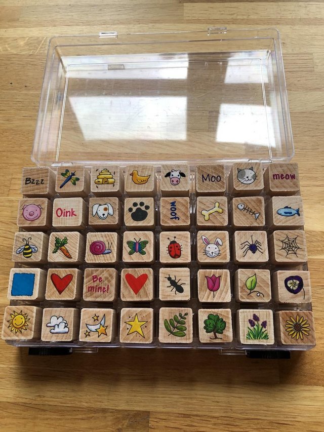 Preview of the first image of 40 Pictorial wooden stamps set in plastic carry case.