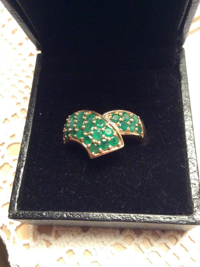 Preview of the first image of Large ladies 9c gold emerald ring..