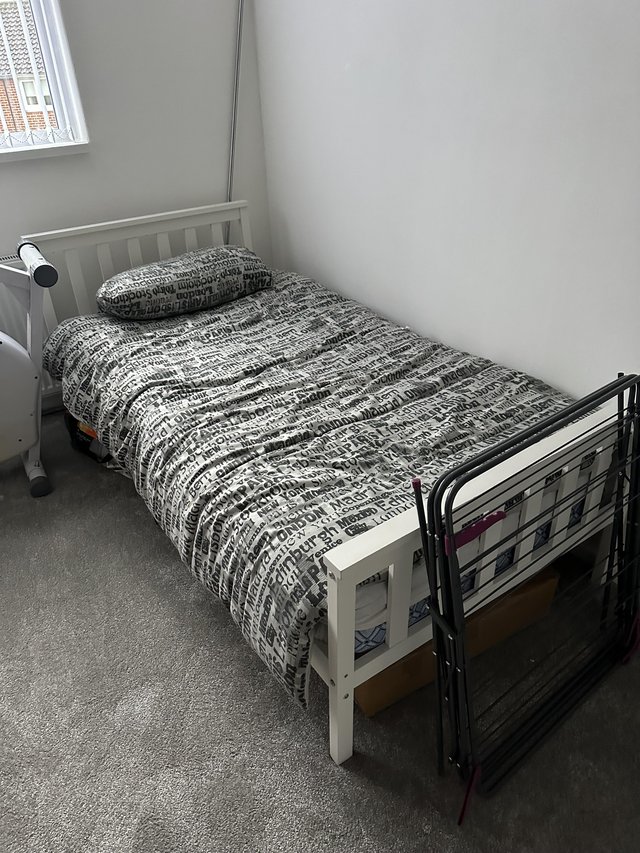 Preview of the first image of Wooden single bed for sale only been used a few times.