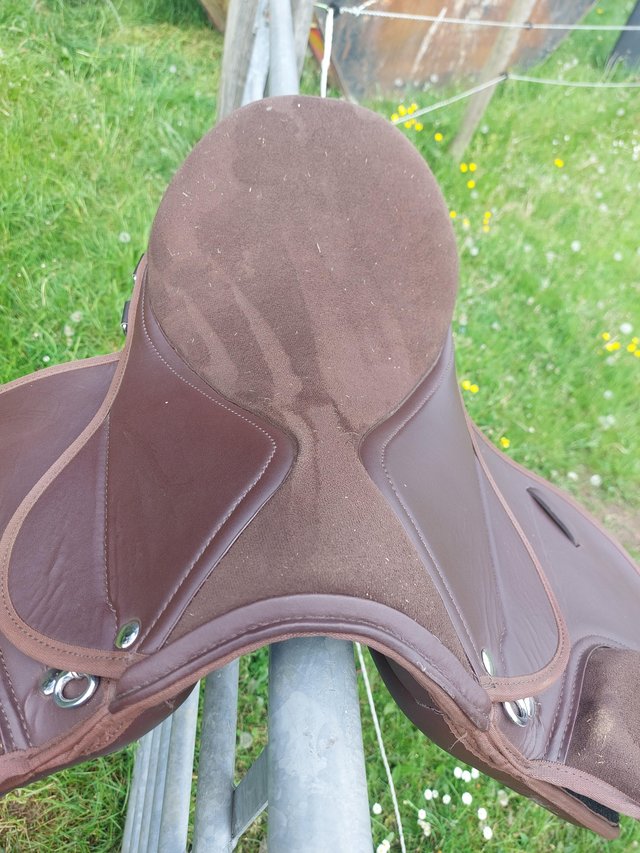 Preview of the first image of Brown suede seat 16" x wide saddle.