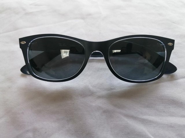 Preview of the first image of Mens Rayban Sunglasses Never Worn.
