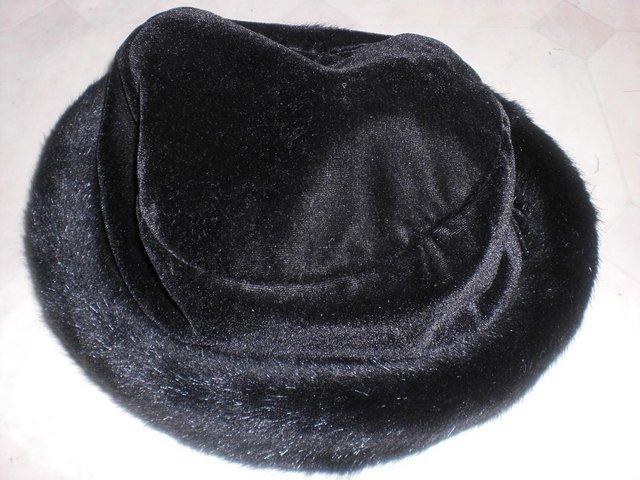 Preview of the first image of Gorgeous M&S Ladies Black Faux Fur Hat.