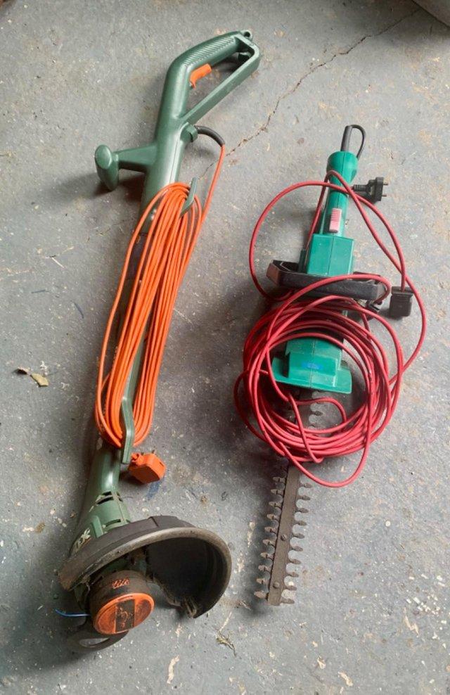 Preview of the first image of Electric hedge trimmer and lawn strimmer.