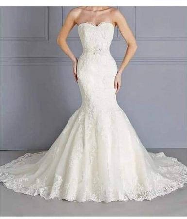 Image 3 of Beautiful Ivory wedding dress. Size 12