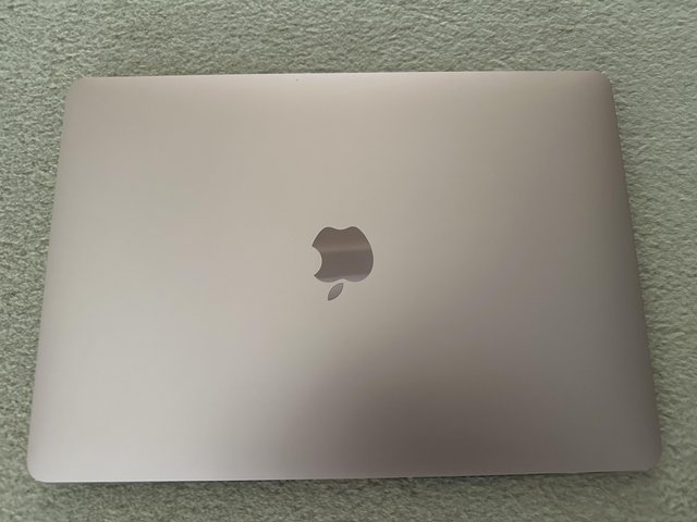 Preview of the first image of M1 MacBook Air 2020 brand new unboxed. Only signed in once.