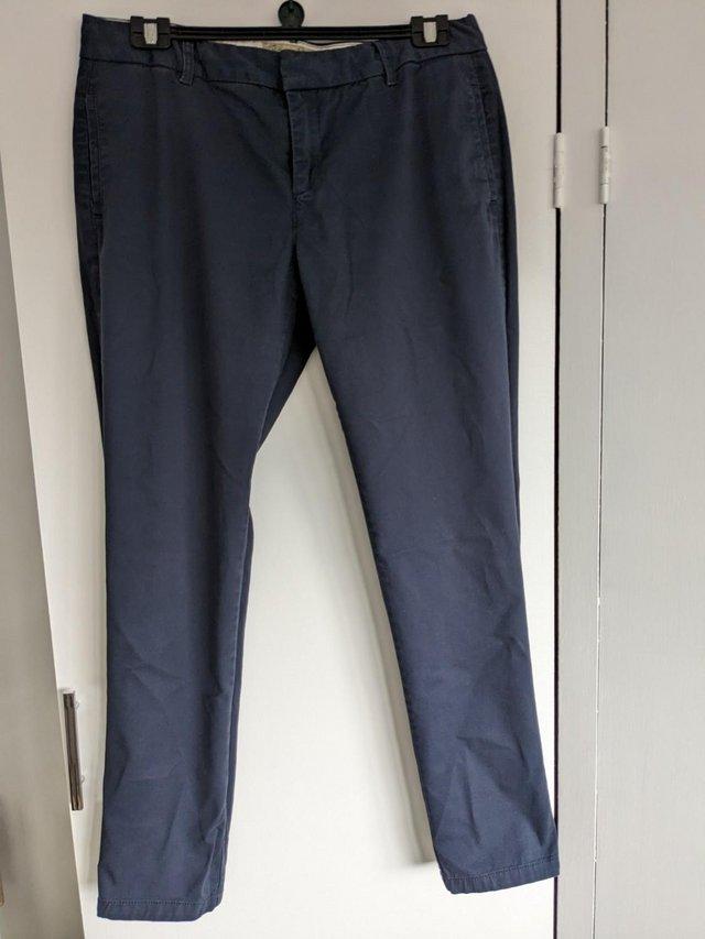 Preview of the first image of Fat Face Navy Blue Ladies Chino's size 14.