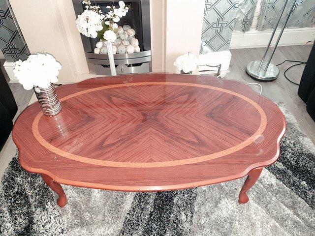 Preview of the first image of COFFEE TABLE FOR SALE BROWN COLOUR.