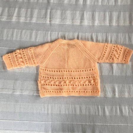 Image 2 of UNWORN vintage 1990's peach hand-knitted matinee jacket.