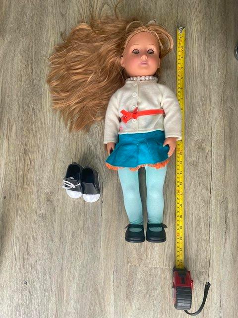 Preview of the first image of Large doll very good condition.