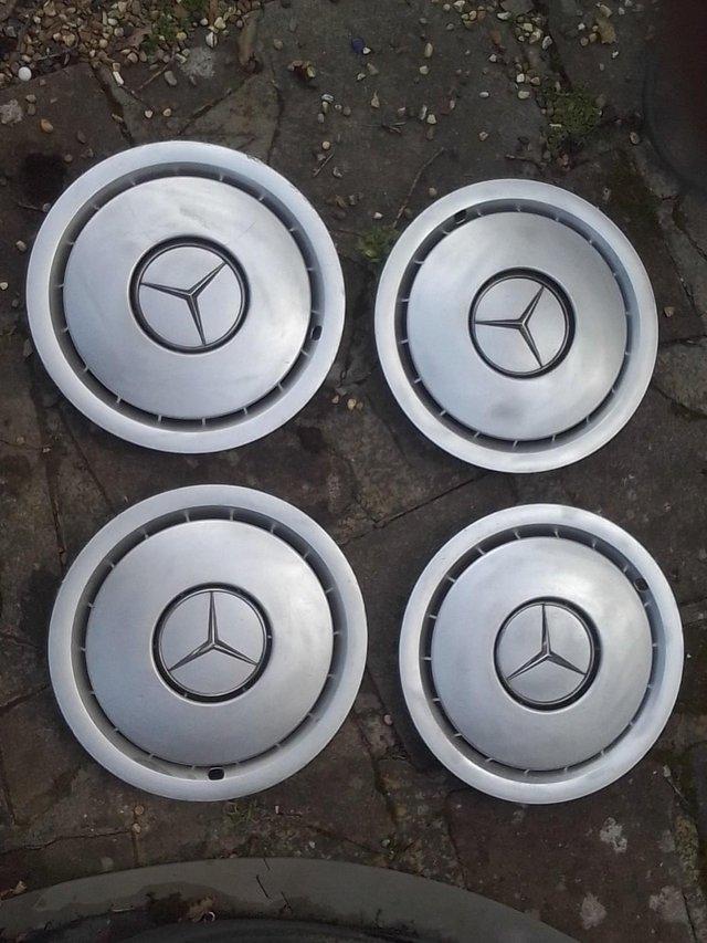 Preview of the first image of Merc 190e plastic wheel trims.