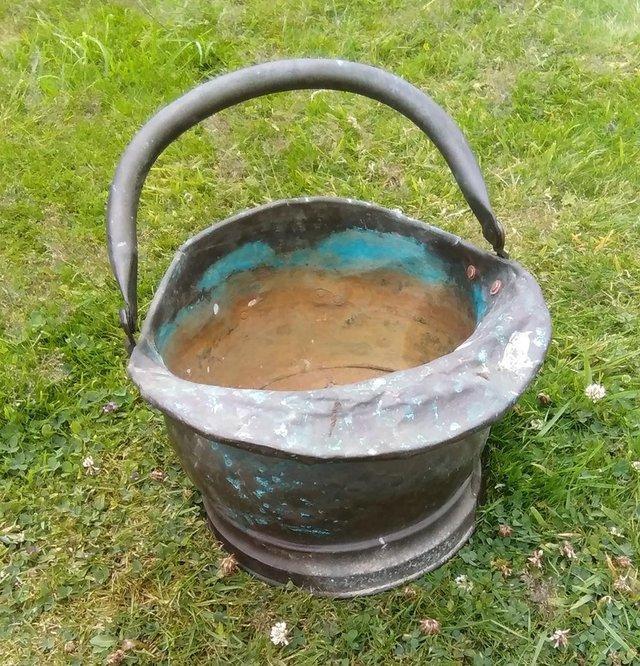 Preview of the first image of ANTIQUE COPPER COAL SCUTTLE (in my family for 100 years).