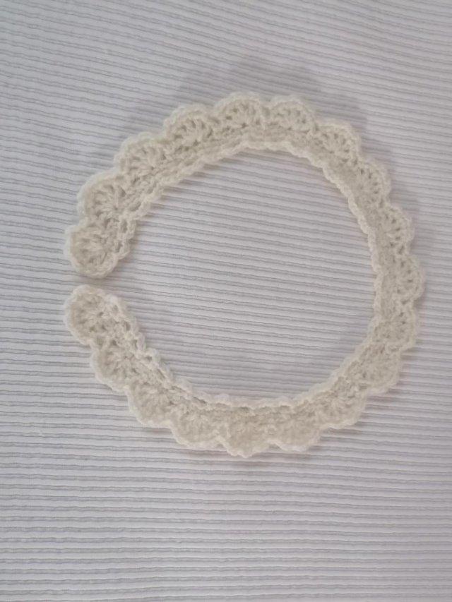 Preview of the first image of LADIES KNITTED COLLAR CREAM COLOUR.