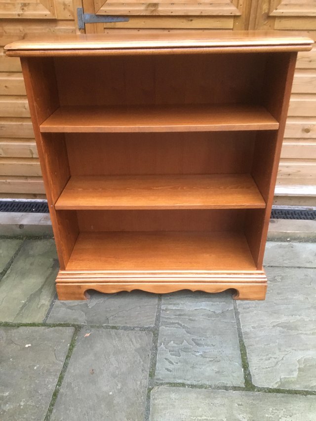 Preview of the first image of An attractive light colour bookcase with adjustable shelves.
