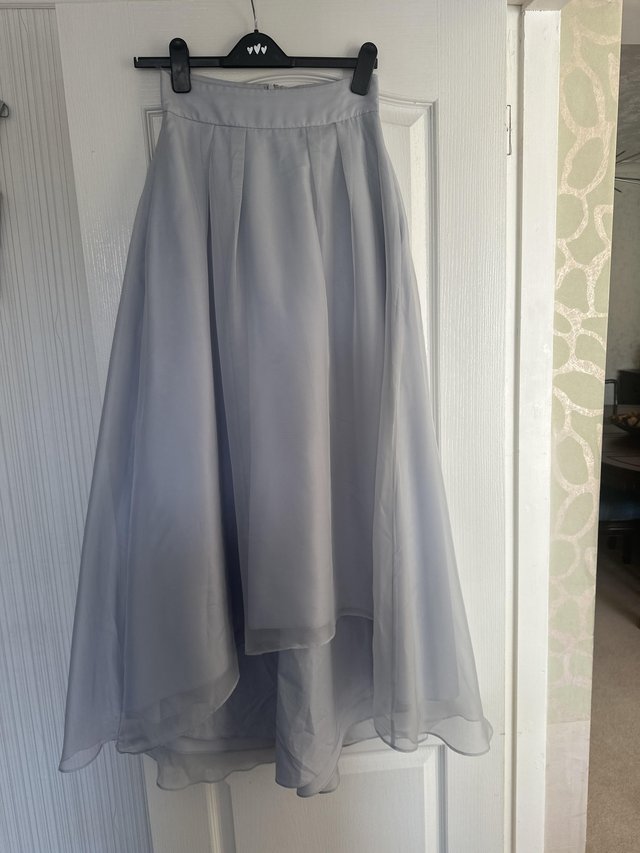 Preview of the first image of silver grey skirt and top from coast.