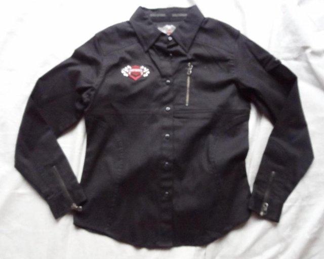 Preview of the first image of Harley Davidson Ladies Medium black shirt.